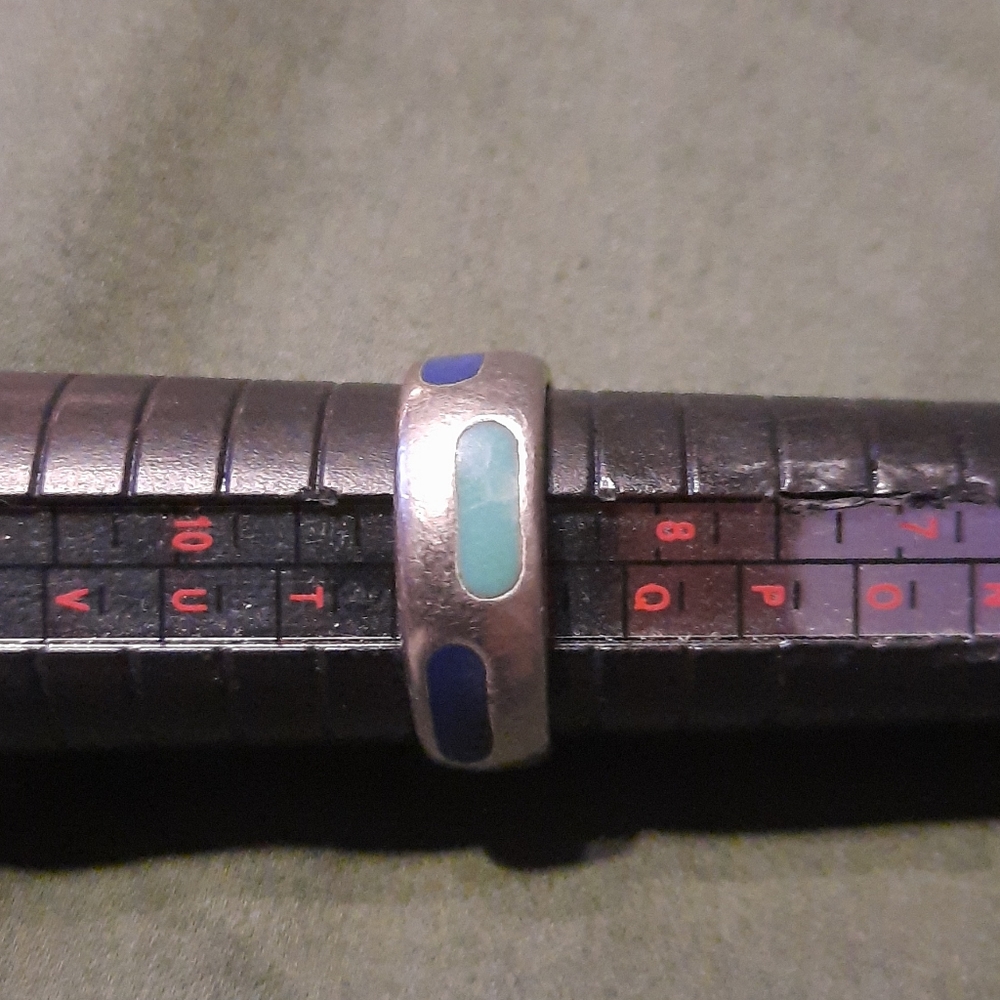 Sterling silver  ring with 7 blue stones